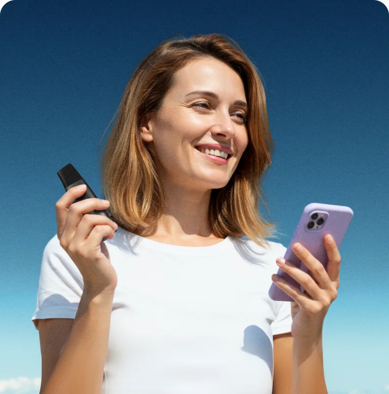 Woman holding a Lumen device and her phone